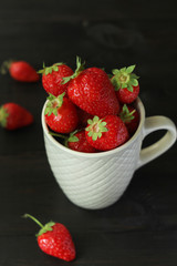 
fresh juicy strawberries in a cup