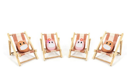 eggs wear fabric mask isolated on white background,image for social distancing holiday or Happy weekend concept.