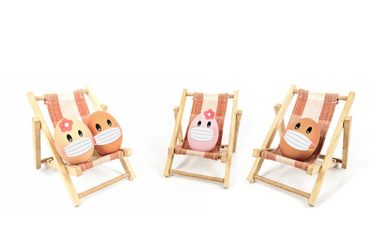 eggs wear fabric mask isolated on white background,image for social distancing holiday or Happy weekend concept.