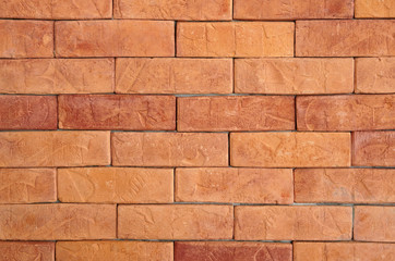 empty orange with brown brick wall or floor with table loft and retro style on top view for texture background and vintage wallpaper or interior and exterior warm construction