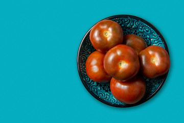 jar with organic tomatoes seen from above.