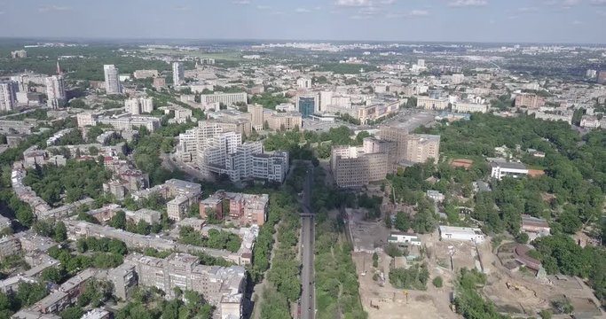 Aerial panorama of Kharkov city from above. Downtown or city center with famous historic buildings and green trees. Freedon square