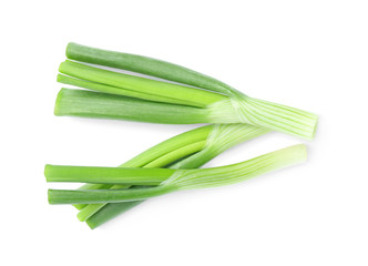 Fresh green spring onions isolated on white, top view