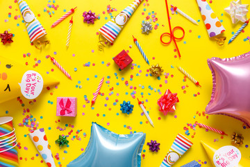 flatout Birthday party card on a yellow background with copy space for text