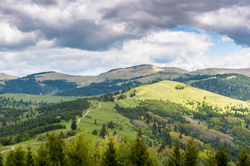 Fototapeta na wymiar Scenic view of the top of the mountain at springtime in Transylvania, Romania, Carpathian mountains.