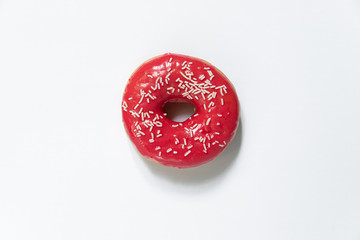 Appetizing sweet donut on a white background. Top view