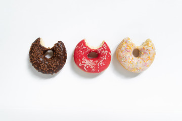 Appetizing sweet donut on a white background. Top view