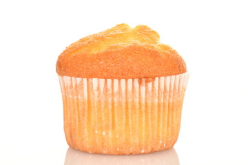Tasty sweet muffins, close-up, on a white background.