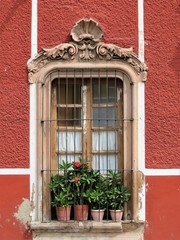 Fototapeta na wymiar Decorative window with flowers