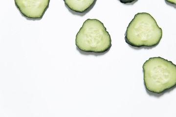 Cucumber slice background. Top view