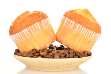 Tasty sweet muffins, close-up, on a white background.