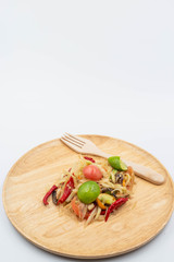 Thai papaya salad on white background.