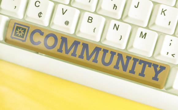 Text sign showing Community. Business photo text specific population with a common characteristics living together