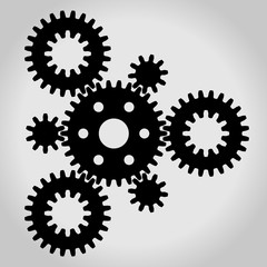 Black silhouette mechanical gears & cogwheel set, small and large, arranged in a triangle. Vector illustration.