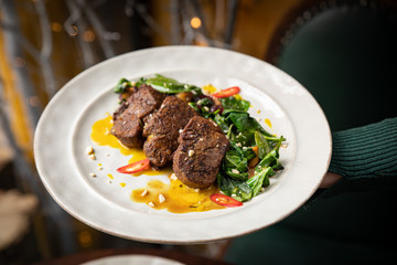 Grilled marbled meat steak in restaurant  