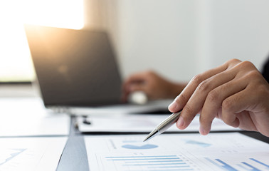 Head of marketing has analyzed the financial income graph of the company in order to develop the structure of the company to be ready for the economy in the future. Financial results analysis concept.