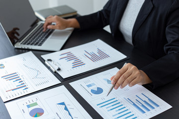 Head of marketing has analyzed the financial income graph of the company in order to develop the structure of the company to be ready for the economy in the future. Financial results analysis concept.