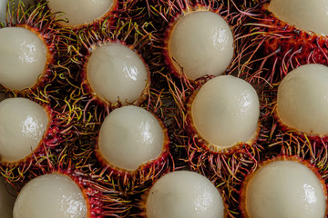 Rambutan, a delicious Thai fruit served on a plate