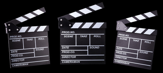 Set of film clapper boards isolated on black background