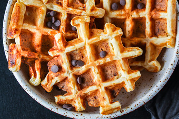 waffles sweet dessert Menu concept healthy eating. food background top view copy space for text table setting