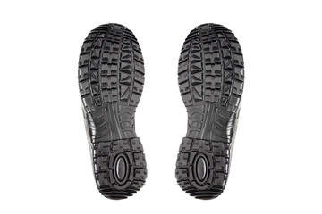 pair of new black work boots rotated with rubber soles, the concept of special shoes for different professions, tracks, protectors