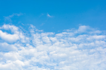 Naklejka na ściany i meble Cirrus clouds on blue sky background..