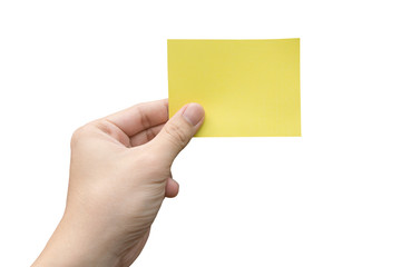 Hand holding yellow paper isolated on white with clipping path.