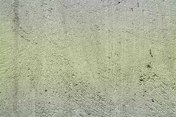 weathered plaster with damaged paint texture - cute abstract photo background