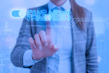 Word writing text Fake News. Business photo showcasing false information publish under the guise of...