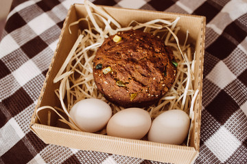gift box with cake and eggs