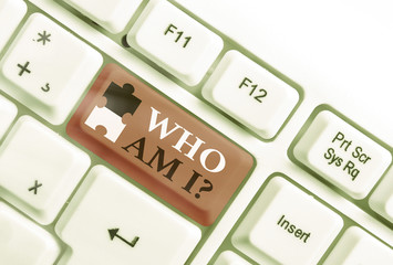 Conceptual hand writing showing Who Am I Question. Concept meaning asking about self identity or an...