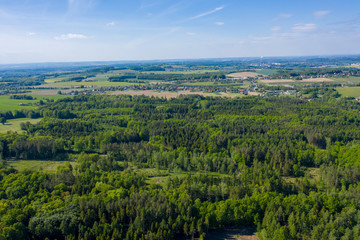 Aerial views of villages, forests and roads, aerial photo green endless forest and fields in Czech