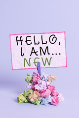 Conceptual hand writing showing Hello I Am New. Concept meaning used greeting or begin telephone...
