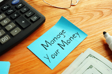 Manage Your Money is shown on the conceptual business photo