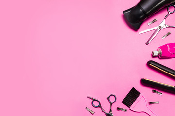 hairdressing accessories on a pink background look from above, mock up, nobody