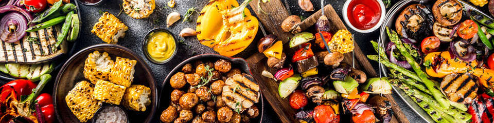 Assortment various barbecue vegan food, set of grill veggies, vegetable bbq party fest, grilled corn, vegan skewers kebabs, hot vegetable salad, with sauces & spices. Vegetarian seasonal summer food