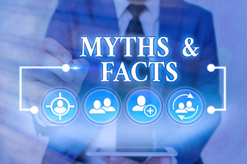 Word writing text Myths And Facts. Business photo showcasing usually traditional story of...