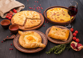 Hospitable Georgian cuisine. Set with delicious food on ethnic plates