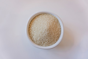 sugar cane isolated in a sugar bowl