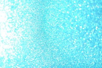 Abstract blue bokeh with blurred background nature blurry light. Shiny copy space. Summertime concept.