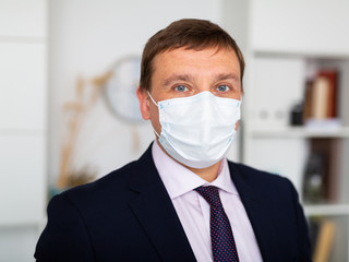 Portrait of businessman in face mask