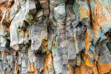 Abstract background from toned mountains texture, volcanic basalt as in Iceland. Bright colorful...