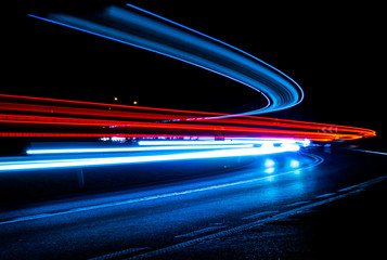 car lights at night on the road