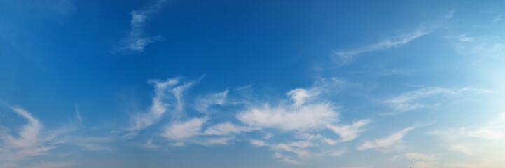 Fototapeta premium Panorama sky with beautiful cloud on a sunny day. Panoramic high resolution image.
