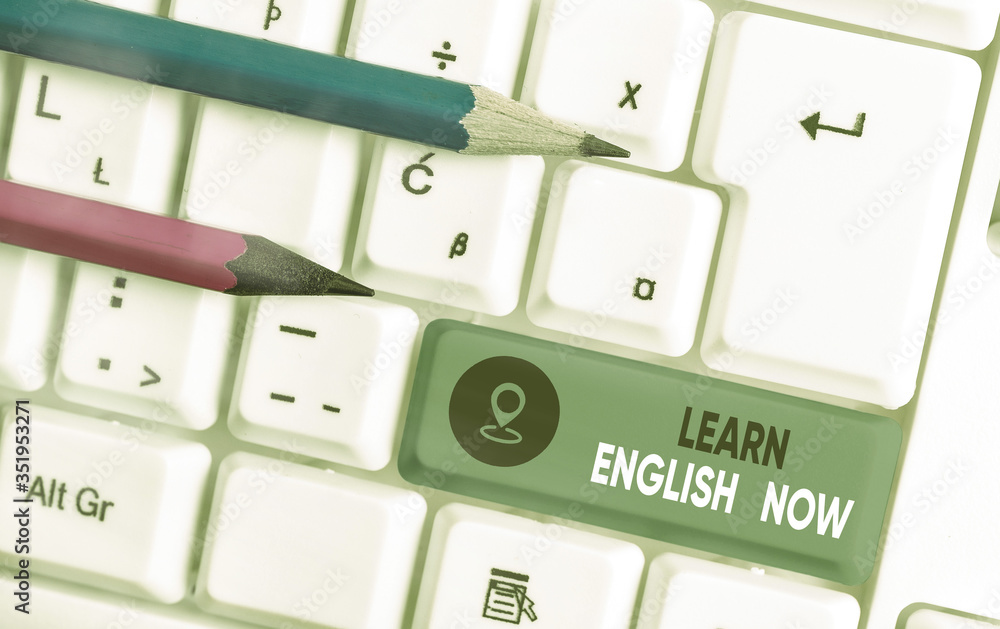 Poster writing note showing learn english now. business concept for gain or acquire knowledge and skill of 