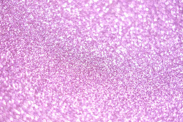 Abstract beautiful blur bokeh background. Shining purple color. Fashion concept.