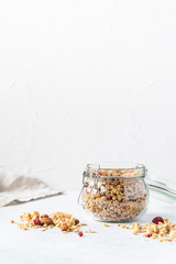 Healthy breakfast set on grey background. The concept of delicious and healthy food. Top view, copy space.