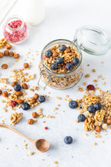 Healthy breakfast set on grey background. The concept of delicious and healthy food. Top view, copy space.