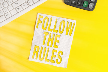 Conceptual hand writing showing Follow The Rules. Concept meaning go with regulations governing...