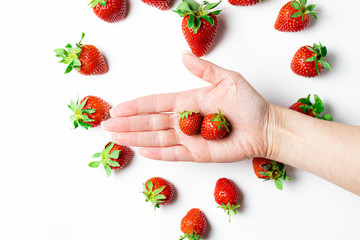 strawberries in a hand